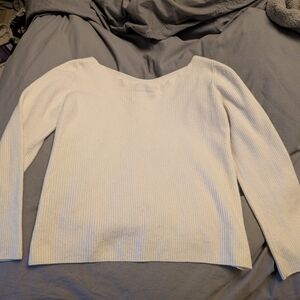 Beautiful Baton Cream colored criss cross sweater